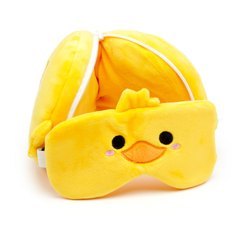 Clara The Duck Travel Pillow Set Open Resting On Table